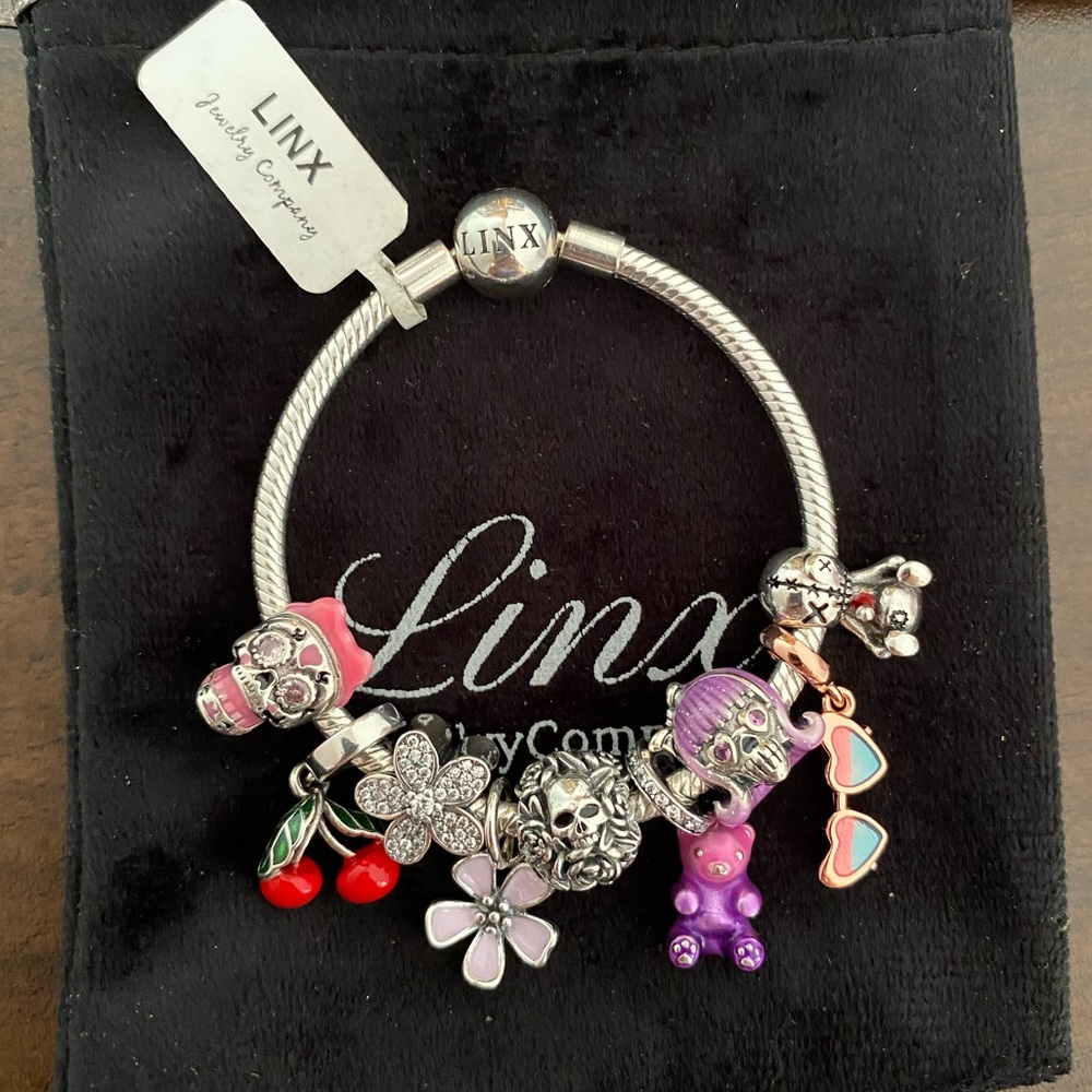 Linx Snake Chain Bracelet with Girly Skull Themed Charms